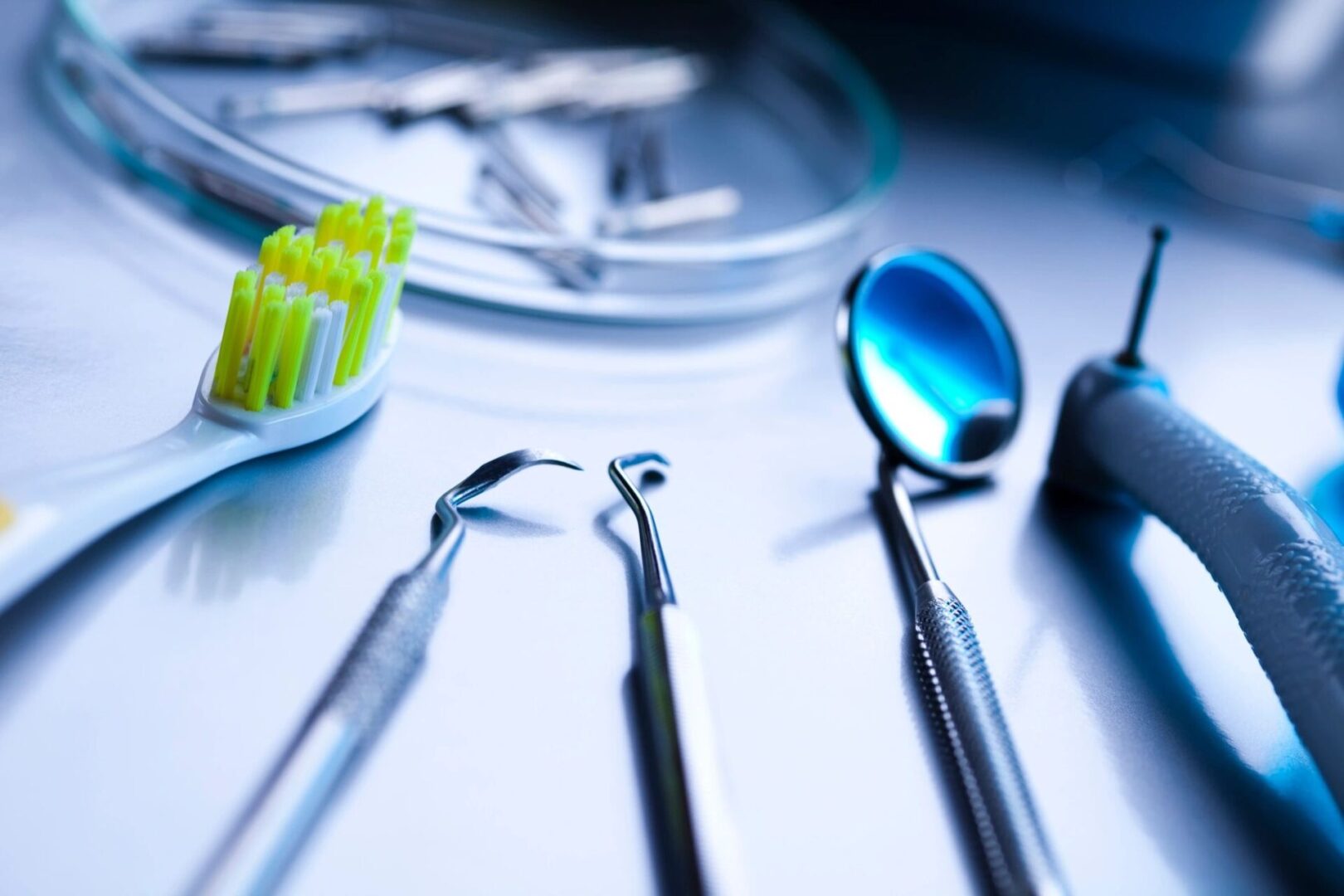 A close up of dental instruments on the table